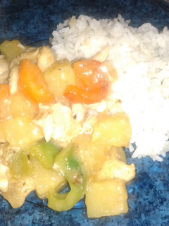A picture of Sweet & Sour Chicken w/Rice.