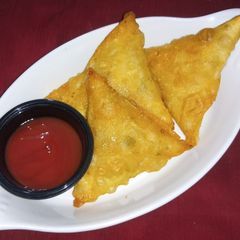 A picture of Pizza Pasta Samosa.