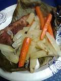 Potatoes and carrots roasted in banana leaf