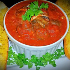A picture of Mike's Marinara Sauce & Garlic Parmesan Bread.