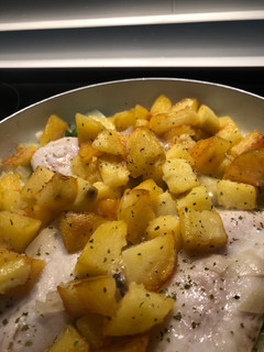 Una foto de Merluza con patatas
