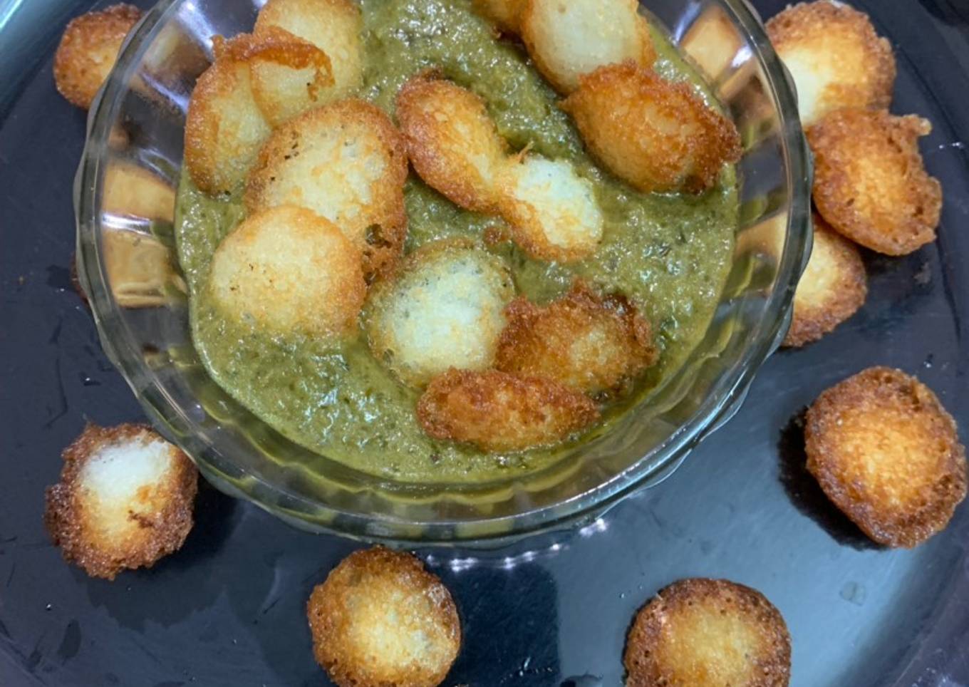 Fried idli in Palak gravy