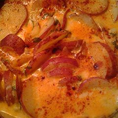 A picture of Potatoes and parsley.