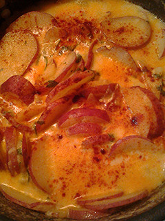 A picture of Potatoes and parsley.