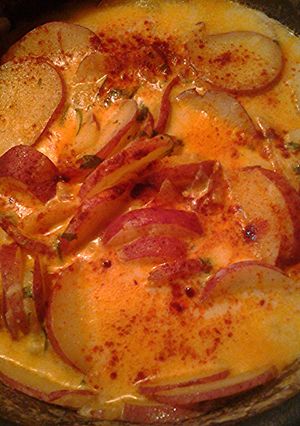 A picture of Potatoes and parsley.