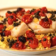 Extra Virgin Olive Oil Poached Cod with Roasted Tomatoes and Fried Capers A picture of Extra Virgin Olive Oil Poached Cod with Roasted Tomatoes and Fried Capers.