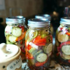 A picture of Spicy Dill Pickles with Jalapenos.