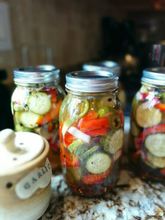 A picture of Spicy Dill Pickles with Jalapenos.
