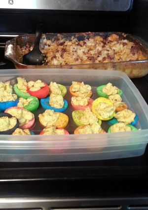 A picture of colored deviled eggs.