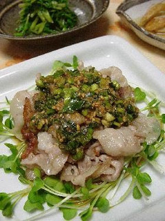 A picture of Pork Belly with Sweet and Sour Onion Sesame Sauce.