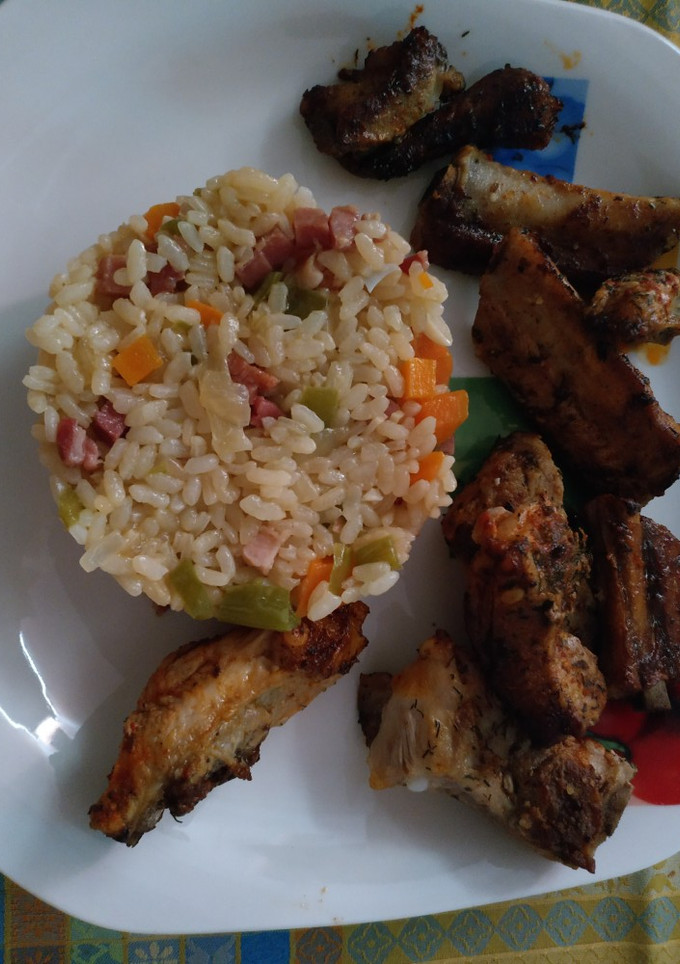 Una foto de Risotto de jamón sin nata y costillas picantes