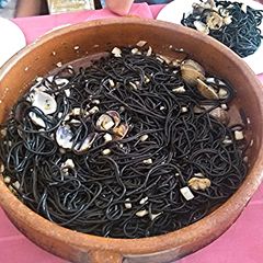 A picture of Black pasta with seafood.