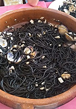 A picture of Black pasta with seafood.