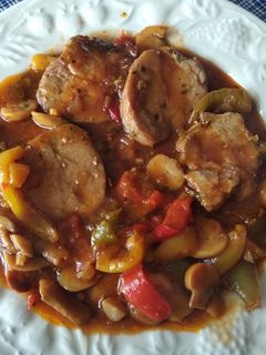 Una foto de Solomillo de cerdo a los tres pimientos