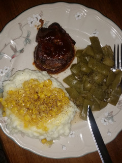 A picture of Bacon wrapped venison tenderloin.