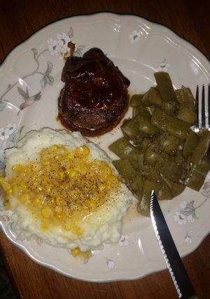 A picture of Bacon wrapped venison tenderloin.