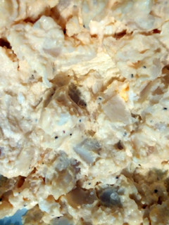 A picture of potatoe and egg salad.