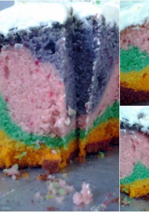 A picture of Rainbow cake with vanilla buttercream icing..