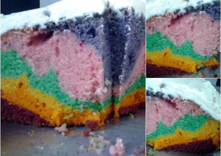 Rainbow cake with vanilla buttercream icing.