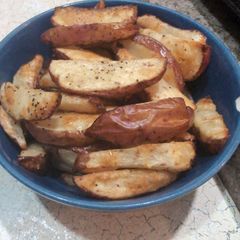 A picture of Potato Wedges.