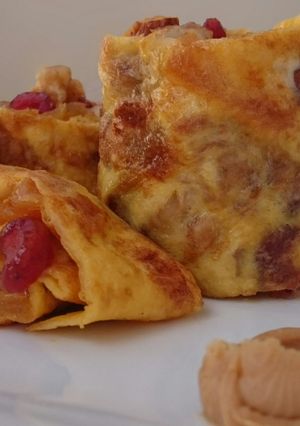 A picture of Fruits And Nuts With Peanut Butter Omelette Roll.