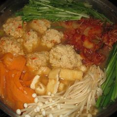 A picture of Homemade Kimchi Hot Pot with Fluffy Tofu Meatballs.