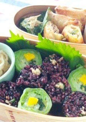 A picture of Black Rice Futomaki Rolls with Wasabi Stems.