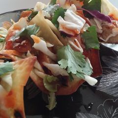 A picture of Chicken wonton tacos.