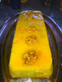 Una foto de Pudín de Naranja y Nueces