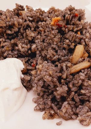 A picture of Cuttlefish ink rice.