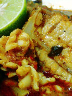 A picture of Assam(Tamarind) Curry fish & squid.
