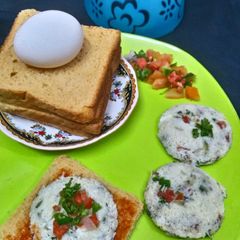 A picture of Steamed veggies egg omelette idli.