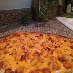 A picture of Chicken Bacon Ranch Pizza.