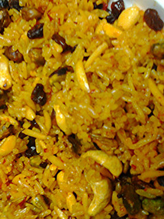 A picture of Fried nuts and rice.