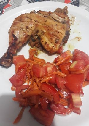 Una foto de Pata Muslo al Horno Bien adobada