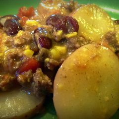 A picture of Cheesy Crockpot Cowboy Casserole.