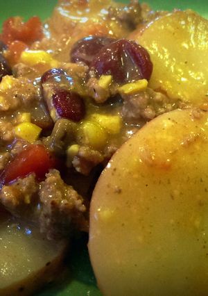 A picture of Cheesy Crockpot Cowboy Casserole.