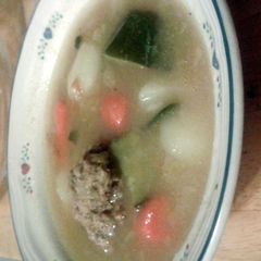 A picture of abondigas soup.
