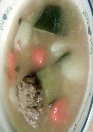 A picture of abondigas soup.