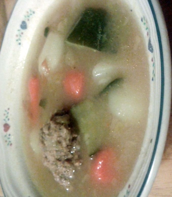 A picture of abondigas soup.