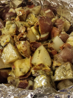 A picture of Slow Cooker Cheesy Bacon Ranch Potatoes.