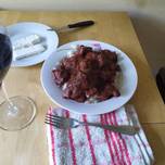 Ρόστο χοιρινό με πατάτες ή μακαρόνια (Απείρανθος Νάξου). Roast pork with potatoes or spaghetti Naxos