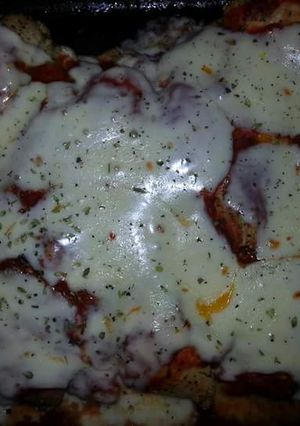 Una foto de Pollo a la pizza