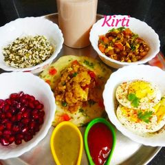 A picture of Semolina veggie uttapam with alu masala and combo.