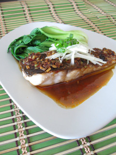 A picture of Hong Kong Style Steamed White Fish with Douchijiang, Spicy Black Bean Sauce.