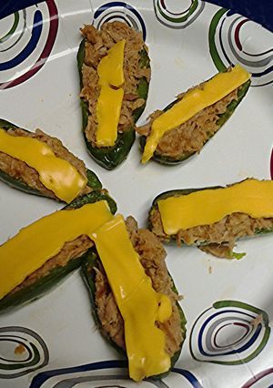 A picture of Jalapeños stuffed with tuna.