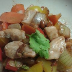 A picture of Chicken with peanuts stir fry.