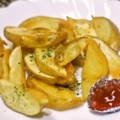 A picture of Thick Potato Wedges with Skins.
