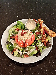 A picture of Chicken Salad Stuffed Tomato.