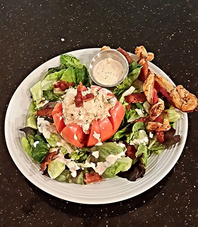 A picture of Chicken Salad Stuffed Tomato.